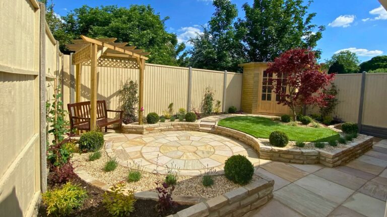 Luton feng shui courtyard garden, Bedfordshire — circular patio and Japanese maple